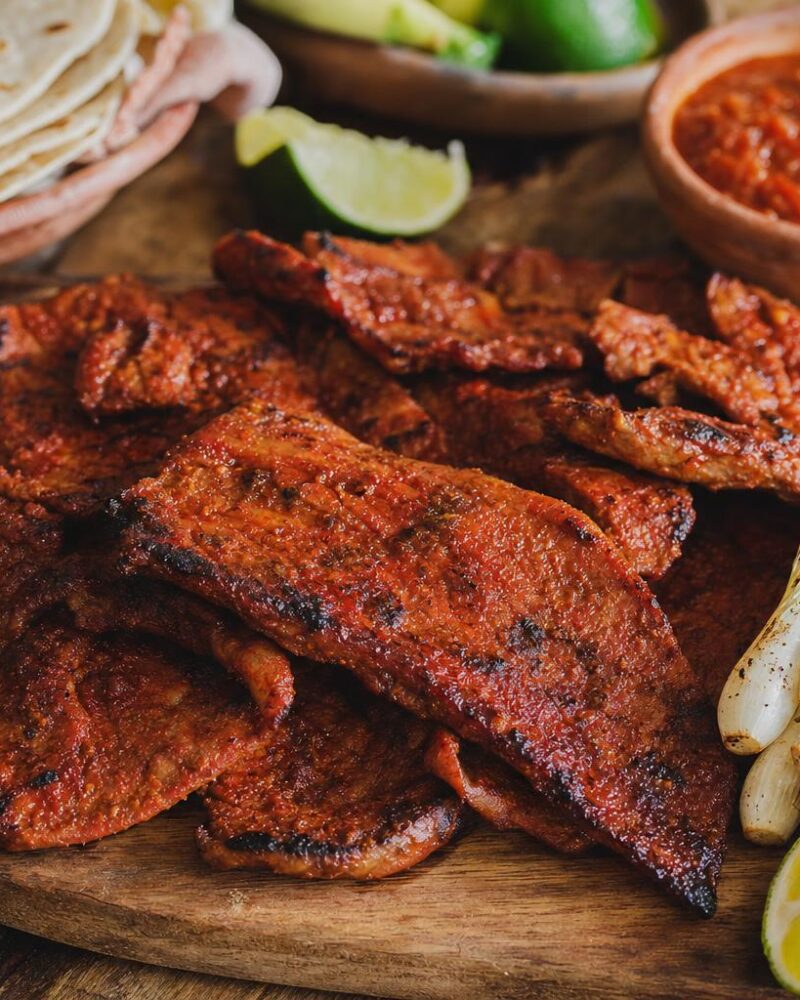 Grilled Oaxacan cecina enchilada pork with tortillas and salsa