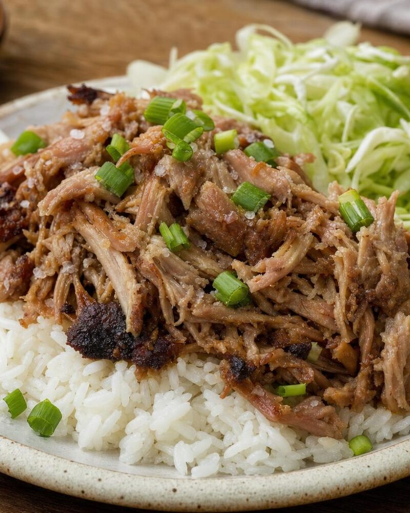 Kalua Pork - smoky shredded pork over rice with cabbage