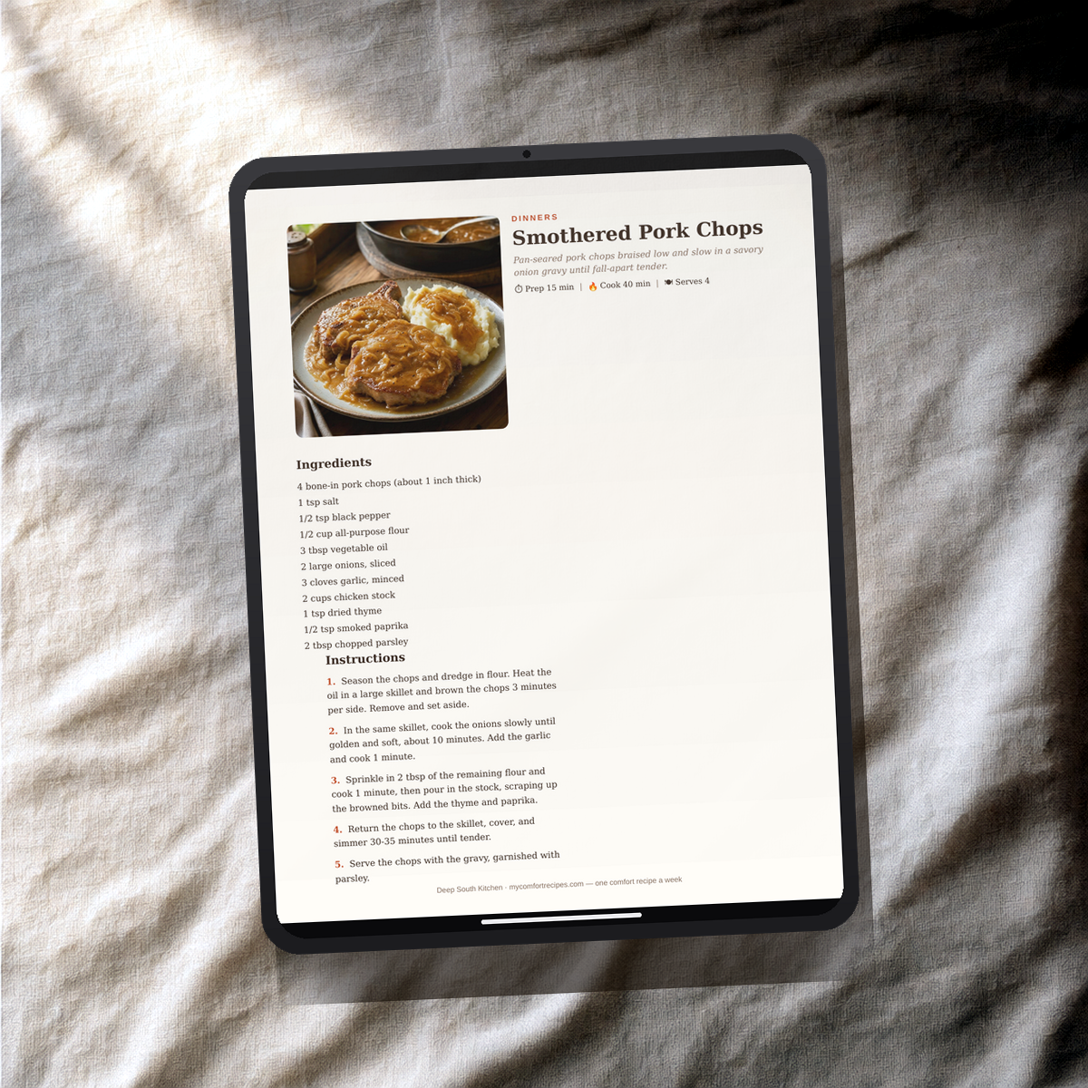 Deep South Kitchen PDF recipe book — Smothered Pork Chops recipe on a tablet